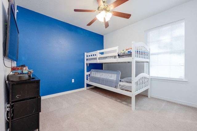 706 Brock Ave, Crestview, FL 32539 - carpeted bedroom featuring baseboards and ceiling fan