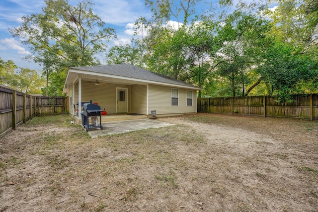 rear view of property featuring a patio