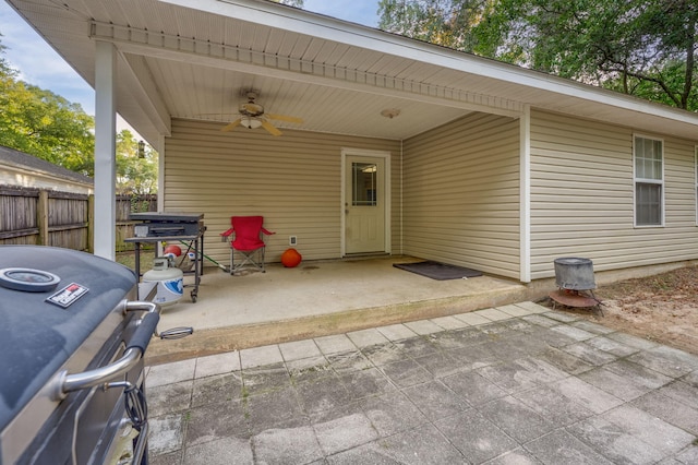 view of patio featuring ceiling fan