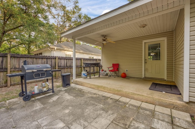 view of patio / terrace featuring area for grilling and ceiling fan