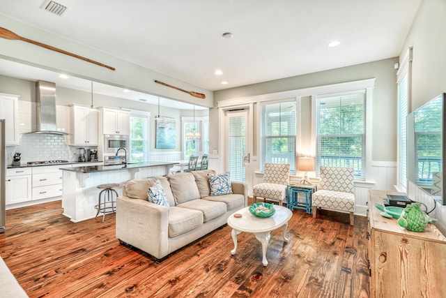 living room featuring dark hardwood / wood-style flooring