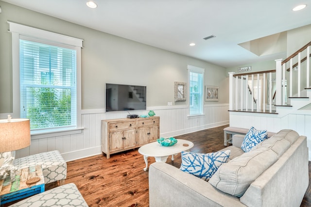 living room with dark hardwood / wood-style floors