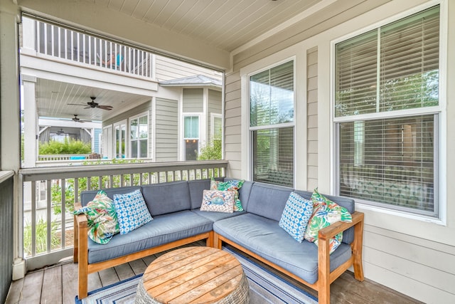 exterior space with outdoor lounge area and ceiling fan