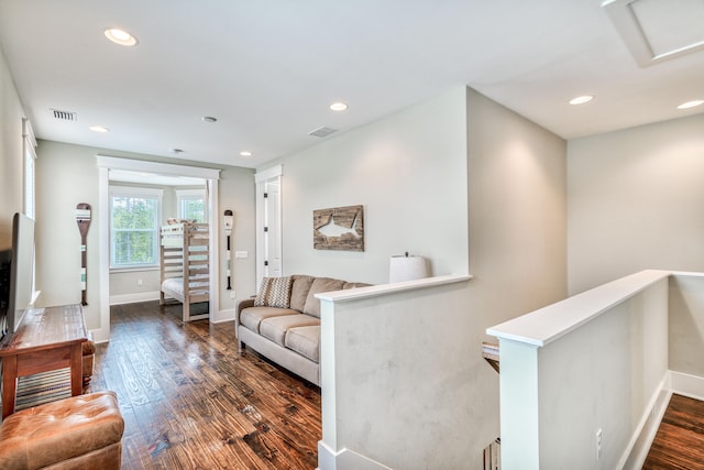 living room featuring dark hardwood / wood-style floors