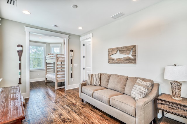 living room featuring dark hardwood / wood-style floors