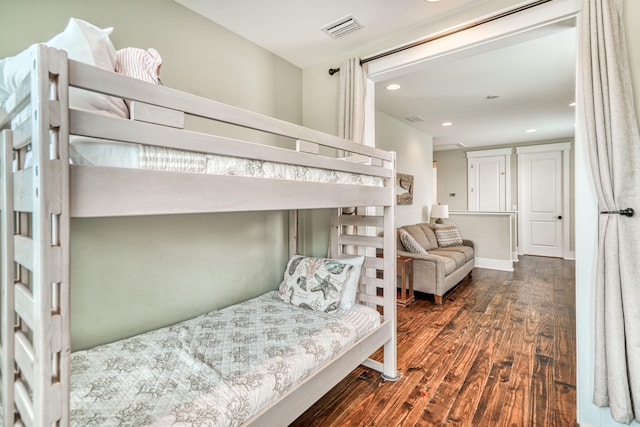 bedroom featuring dark hardwood / wood-style floors