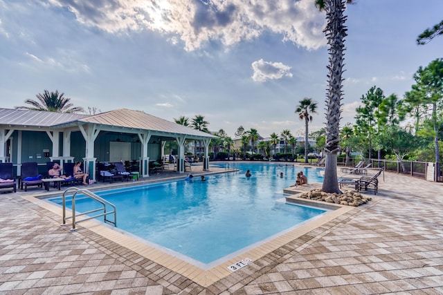 view of pool featuring a gazebo and a patio