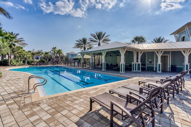 view of pool featuring a patio