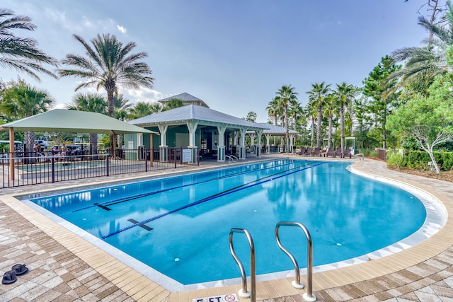 view of pool featuring a patio