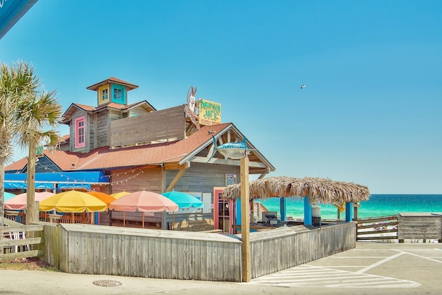 view of playground with a water view