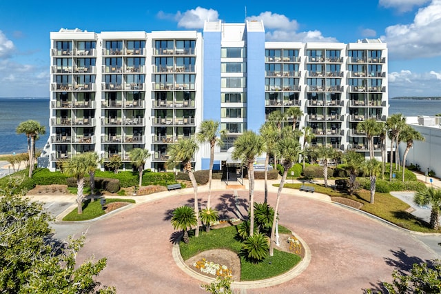 view of building exterior with a water view