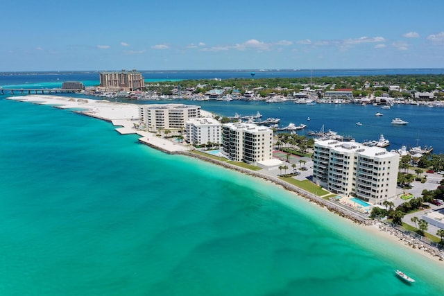 aerial view featuring a view of the beach and a water view