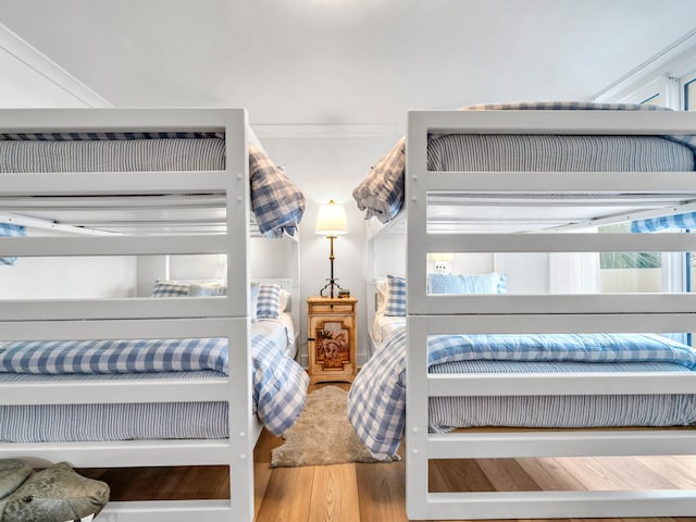 bedroom featuring wood-type flooring