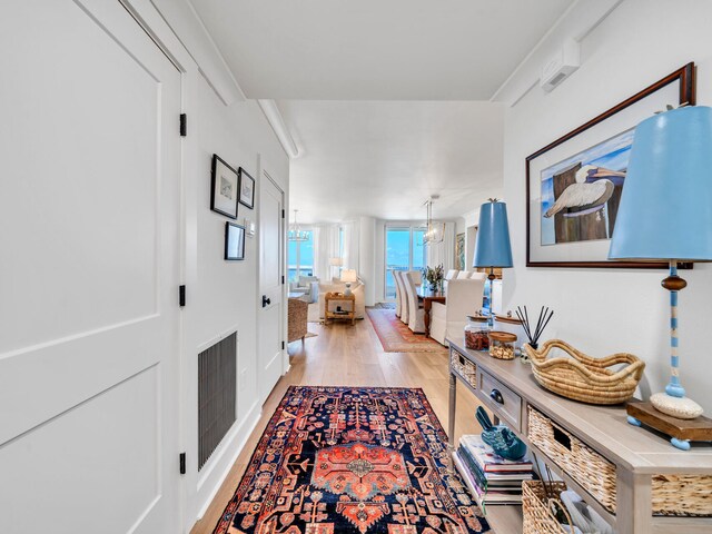 110 Gulf Shore Dr Unit 221, Destin, FL 32541 - corridor featuring light wood finished floors