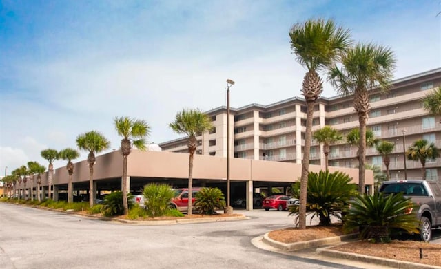 520 Santa Rosa Blvd Unit 100, Fort Walton Beach, FL 32548 - view of apartment building / complex featuring covered parking