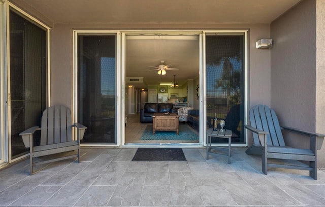 doorway to property featuring a patio