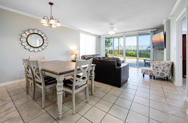 520 Santa Rosa Blvd Unit 100, Fort Walton Beach, FL 32548 - dining space with crown molding, light tile patterned floors, healthy amount of natural light, a textured ceiling, and ceiling fan