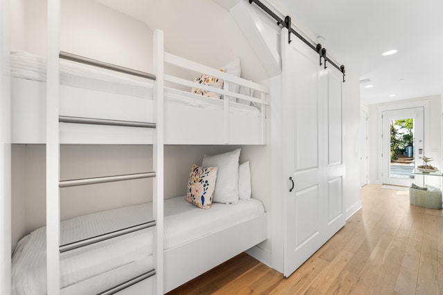 bedroom with light wood-type flooring