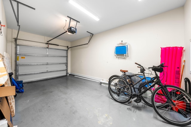 garage featuring a garage door opener