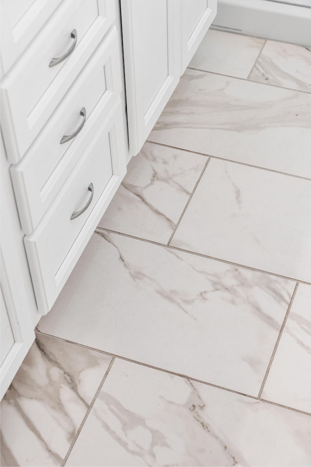 interior details featuring white cabinetry