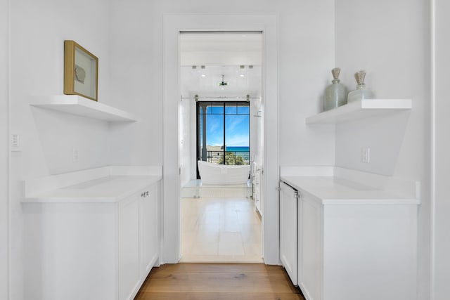 interior space with hardwood / wood-style floors