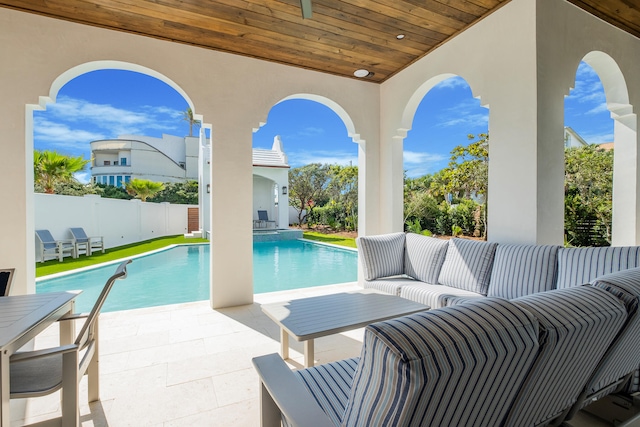 view of pool featuring outdoor lounge area and a patio area