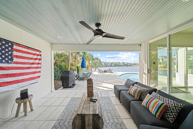 4639 Destiny Way, Destin, FL 32541 - view of patio with an outdoor living space, a water view, area for grilling, and a ceiling fan