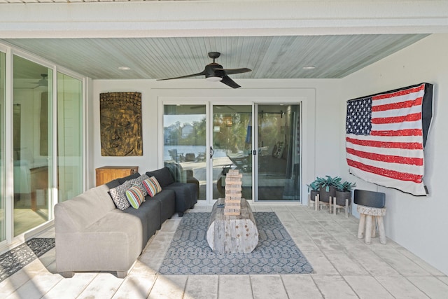 view of patio featuring outdoor lounge area and ceiling fan