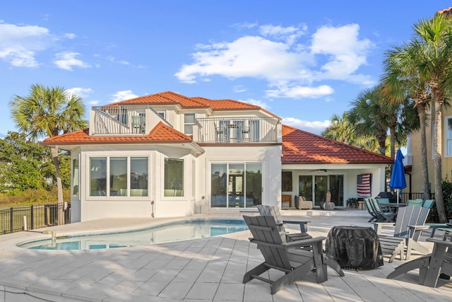 4639 Destiny Way, Destin, FL 32541 - rear view of property featuring a balcony, a tile roof, a patio area, ceiling fan, and fence