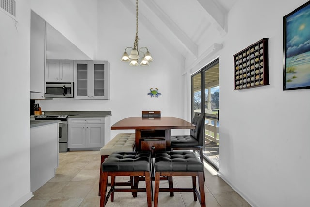 dining space with beam ceiling, light tile patterned floors, high vaulted ceiling, and an inviting chandelier