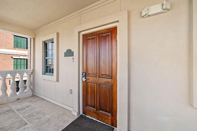 10343 E County Highway 30a Unit 316, Seacrest, FL 32461 - doorway to property with stucco siding