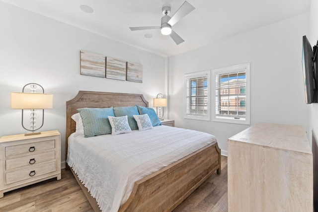 10343 E County Highway 30a Unit 316, Seacrest, FL 32461 - bedroom with wood finished floors, ceiling fan, and baseboards