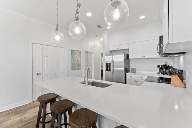 10343 E County Highway 30a Unit 316, Seacrest, FL 32461 - kitchen featuring a sink, stainless steel fridge, ornamental molding, range, and light wood finished floors