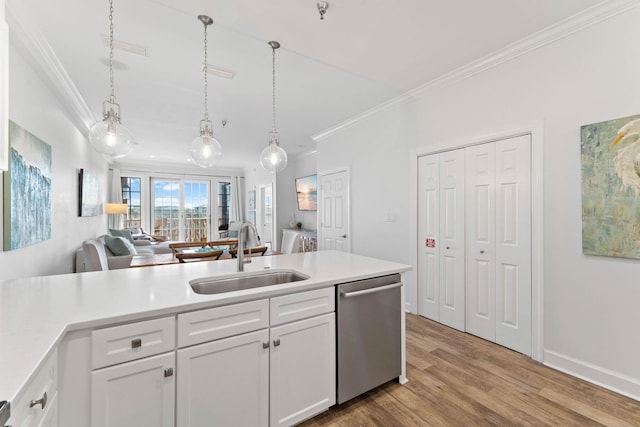 10343 E County Highway 30a Unit 316, Seacrest, FL 32461 - kitchen with a sink, dishwasher, ornamental molding, decorative light fixtures, and light countertops