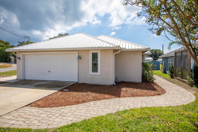 view of home's exterior with a garage