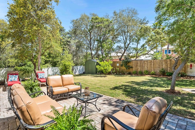 view of patio featuring a storage shed and an outdoor hangout area