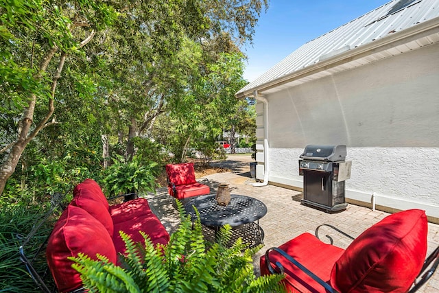 view of patio with a grill