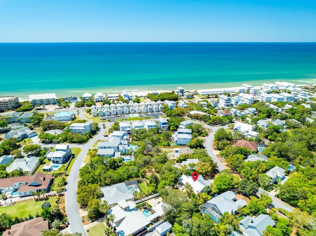 aerial view of residential area with a nearby body of water