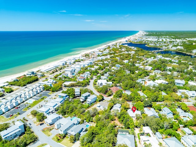 aerial view with a view of the beach and a water view