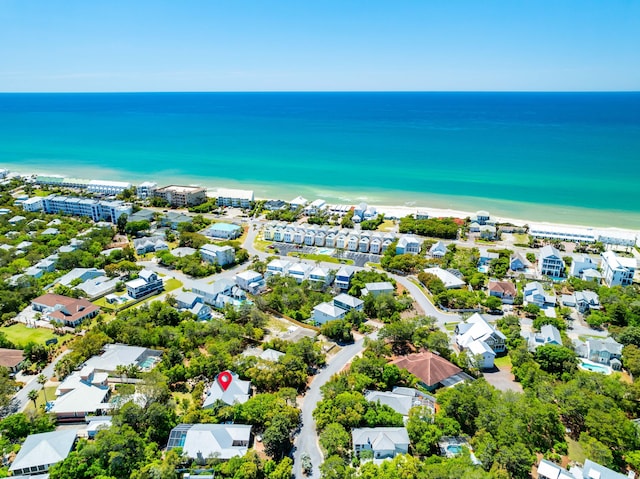 aerial view of residential area with extended coastline