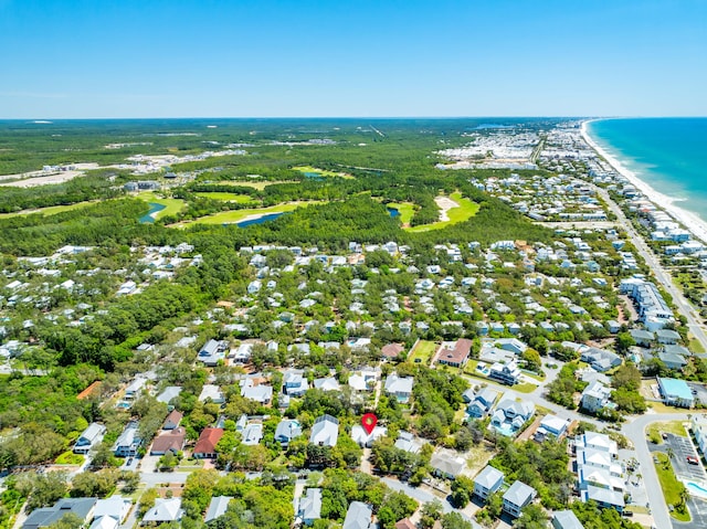 drone / aerial view with a water view and a view of the beach