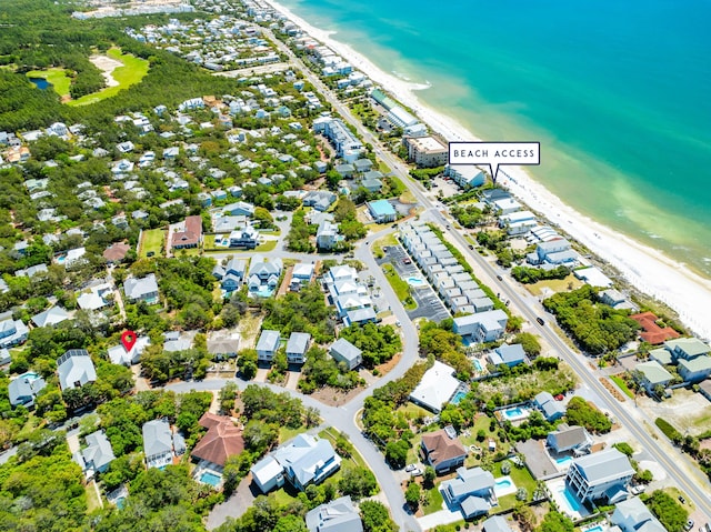 aerial view with a view of the beach and a water view