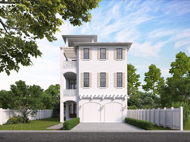 view of front of home featuring a garage and a balcony