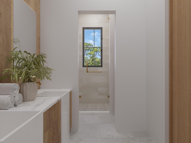 bathroom with a tub to relax in