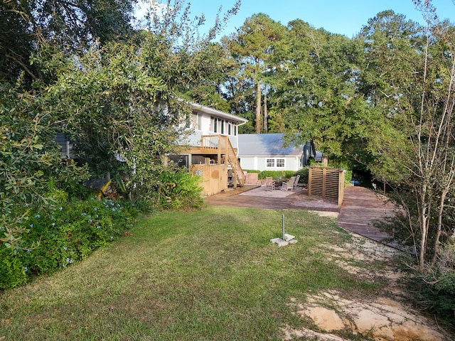 view of yard with a deck