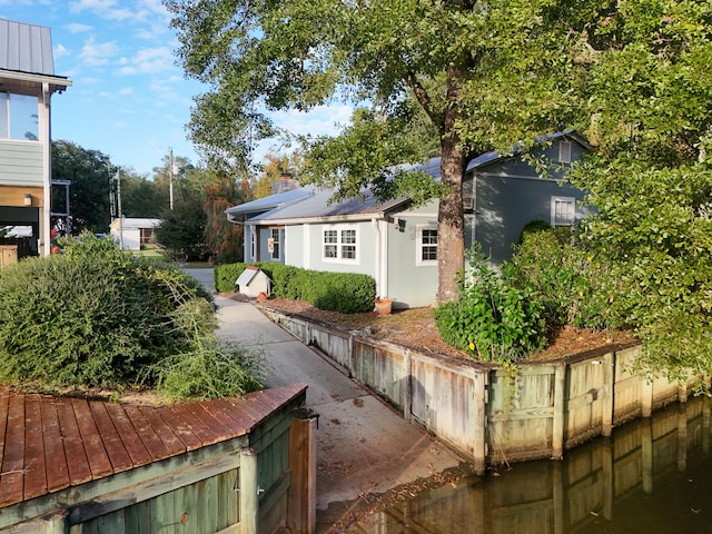 view of side of property with a patio area