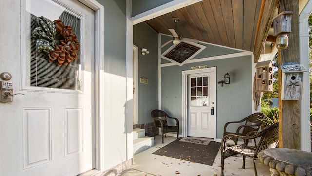 entrance to property featuring ceiling fan