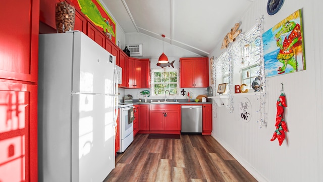 kitchen with dark wood-type flooring, white appliances, sink, and lofted ceiling