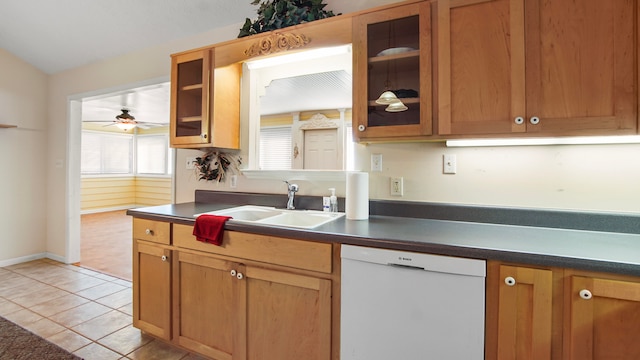 kitchen featuring white dishwasher, light tile patterned flooring, ceiling fan, and sink