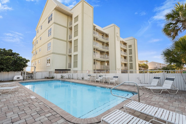 view of pool featuring a patio area